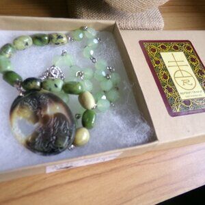 jade & green serpentine beaded necklace. Carved lady pendent